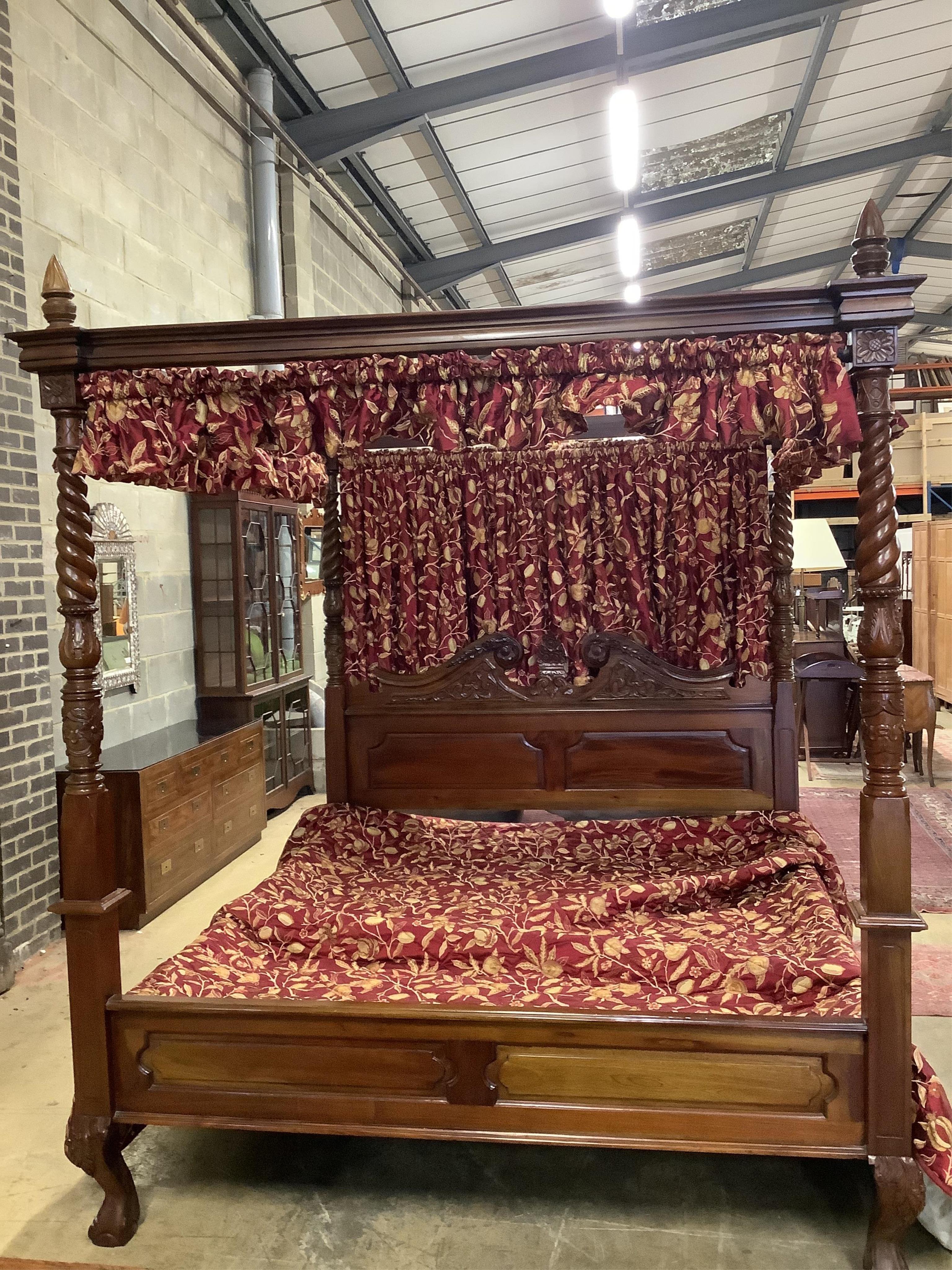 A large George III style mahogany four poster bedframe, width 192cm, length 214cm, height 236cm. Condition - good